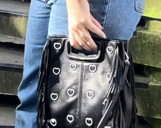 Black fringed handbag with heart accents